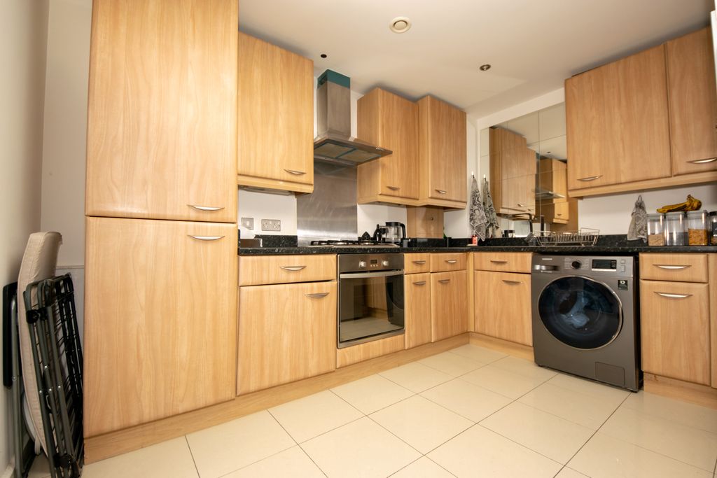 Property photo 3 of 8 Kitchen