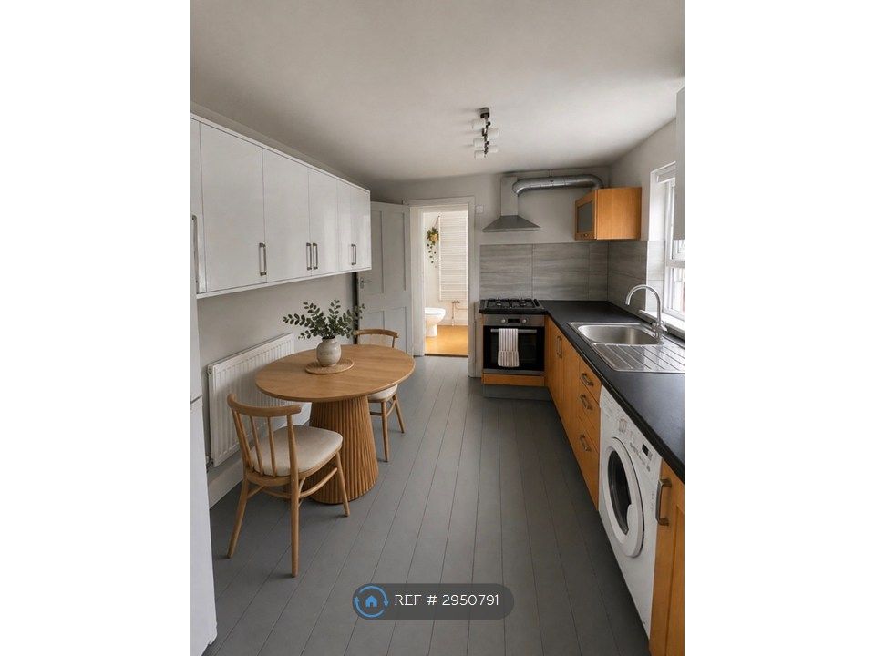 Property photo 2 of 11 Modern Kitchen