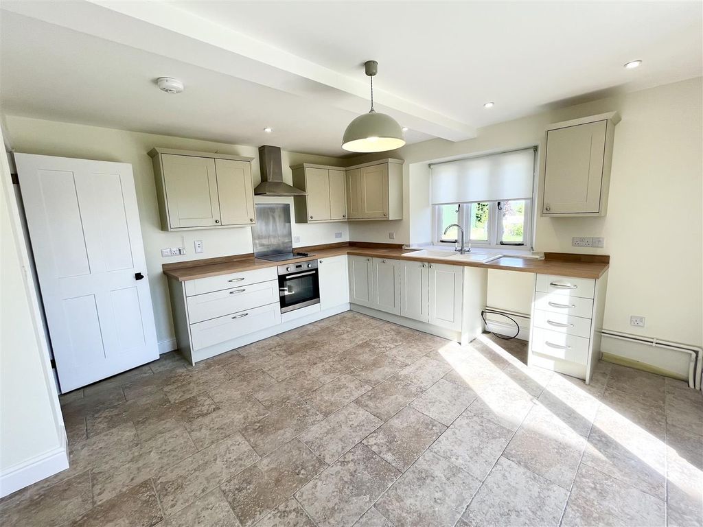 Property photo 2 of 12 Kitchen