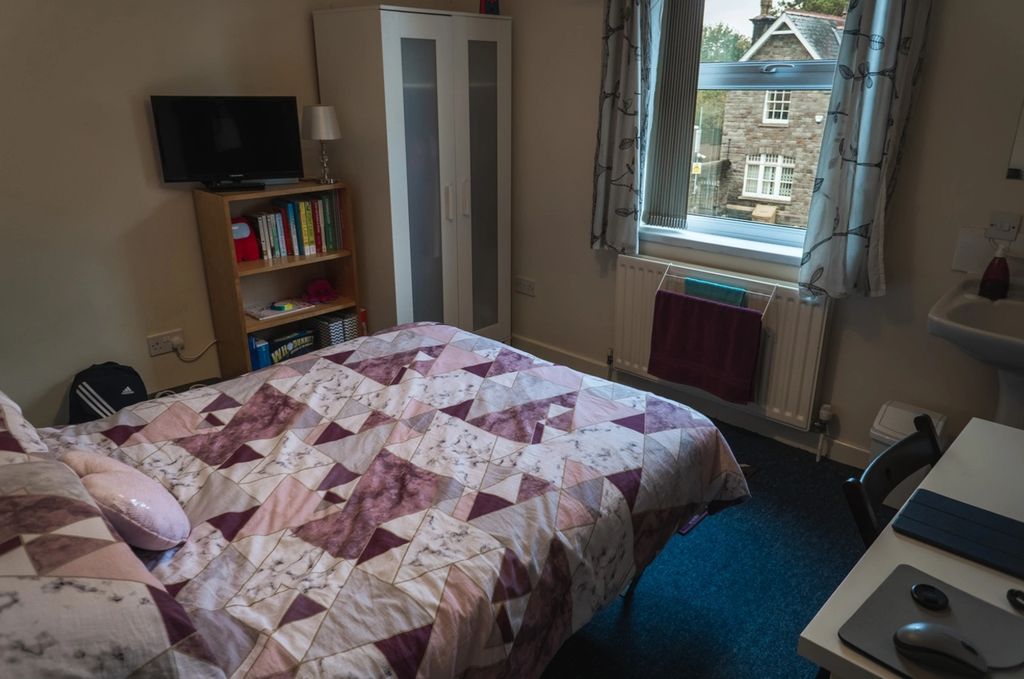 Property photo 2 of 6 A Cozy Double Bedroom Featuring A Patterned Bedspr...
