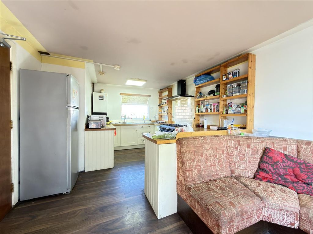 Property photo 2 of 11 Kitchen & Dining Room