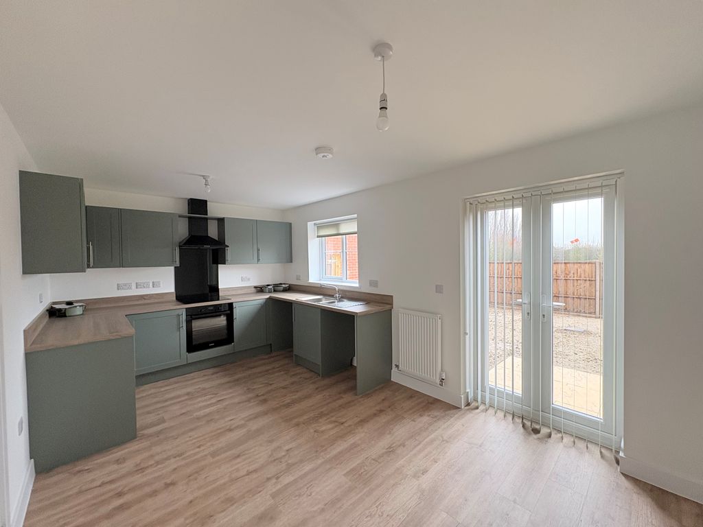 Property photo 3 of 7 Kitchen