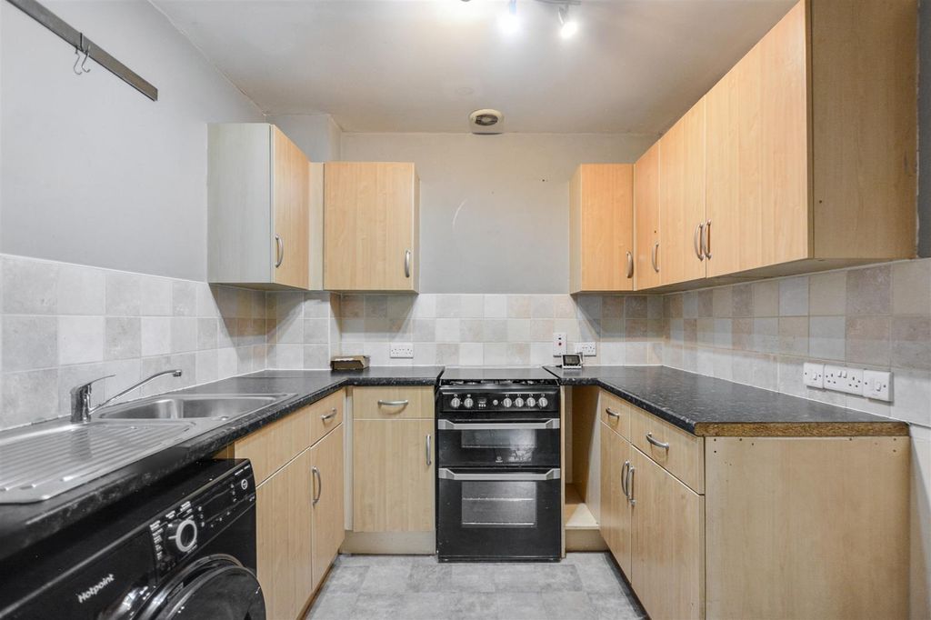 Property photo 3 of 12 Kitchen