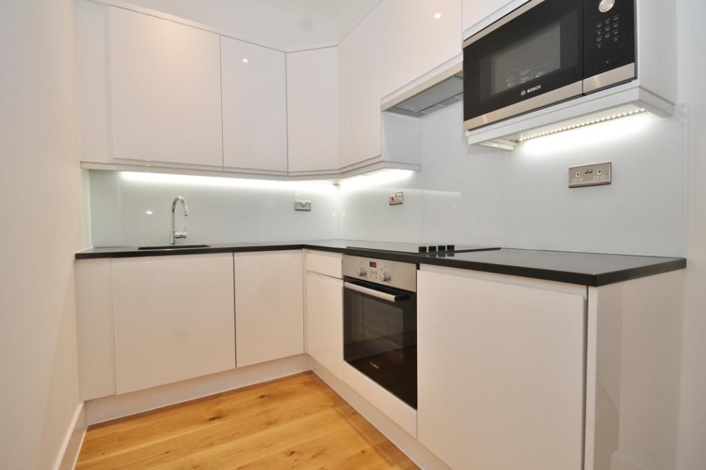 Property photo 3 of 8 Kitchen