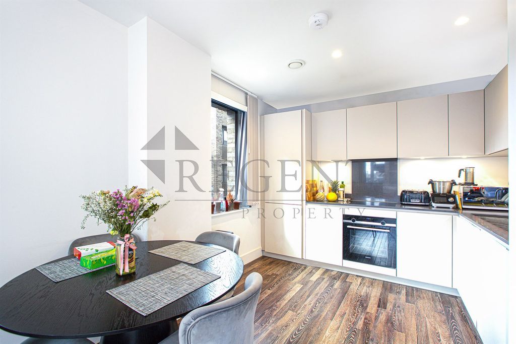 Property photo 3 of 11 Dining Room To Kitchen View
