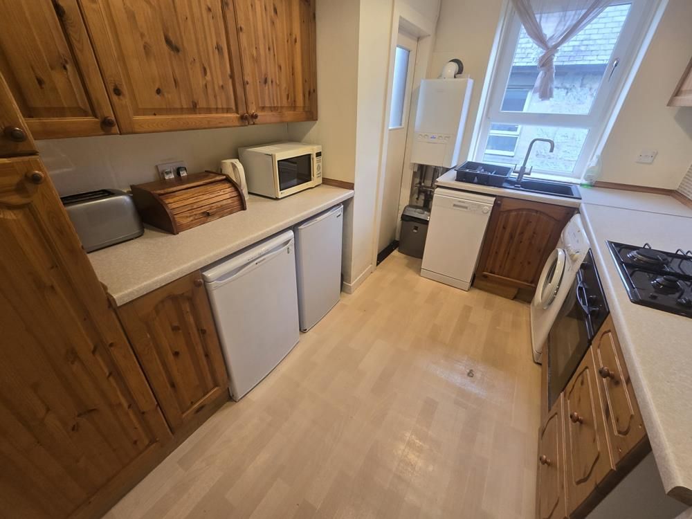 Property photo 3 of 6 Kitchen
