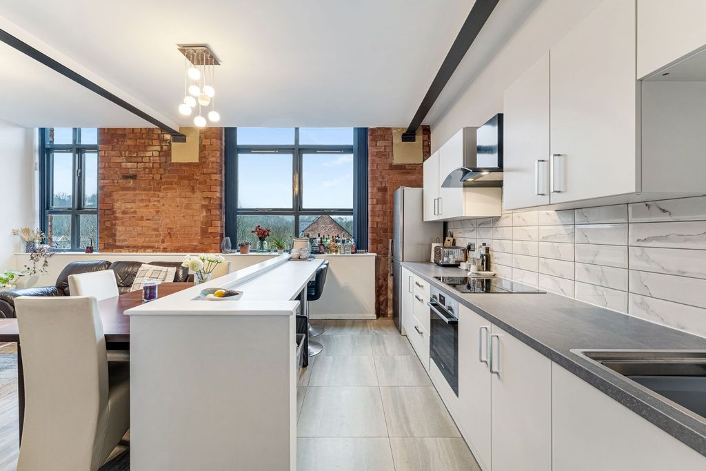 Property photo 3 of 12 Kitchen