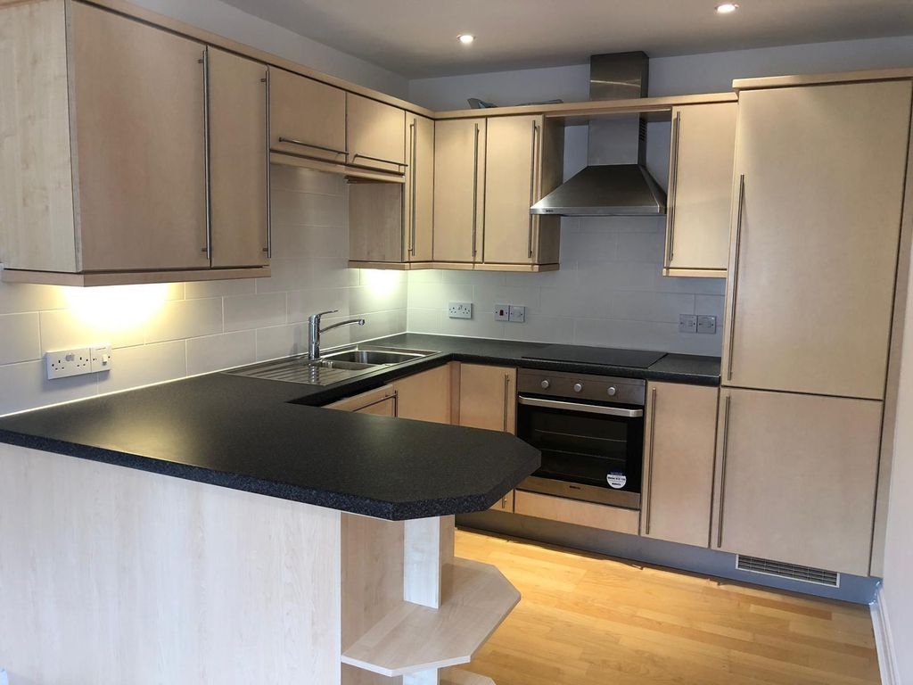 Property photo 3 of 8 Kitchen