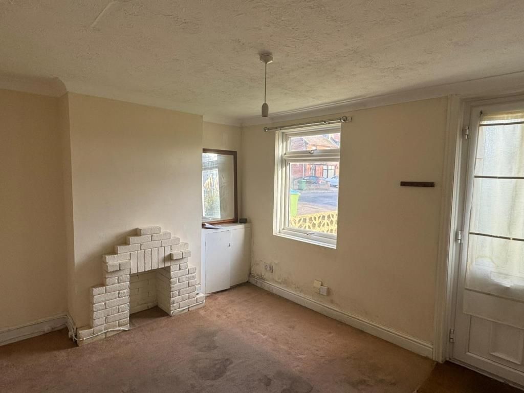 Property photo 2 of 9 Living Room With Old Fireplace