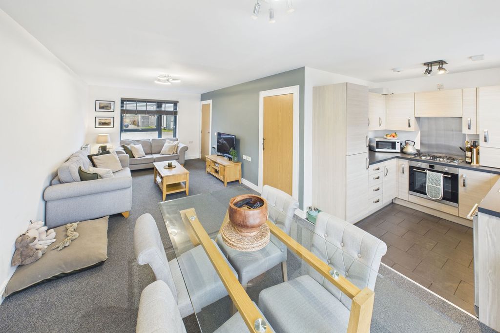 Property photo 3 of 17 Kitchen/Living Area Angle 2