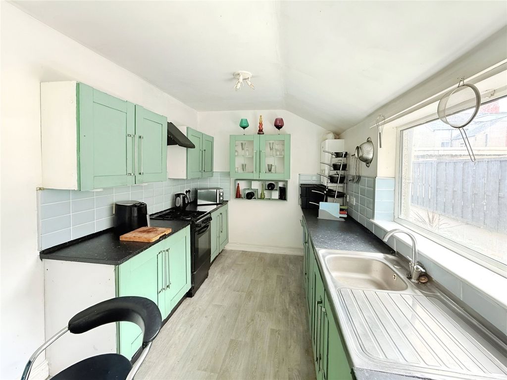 Property photo 2 of 12 Kitchen