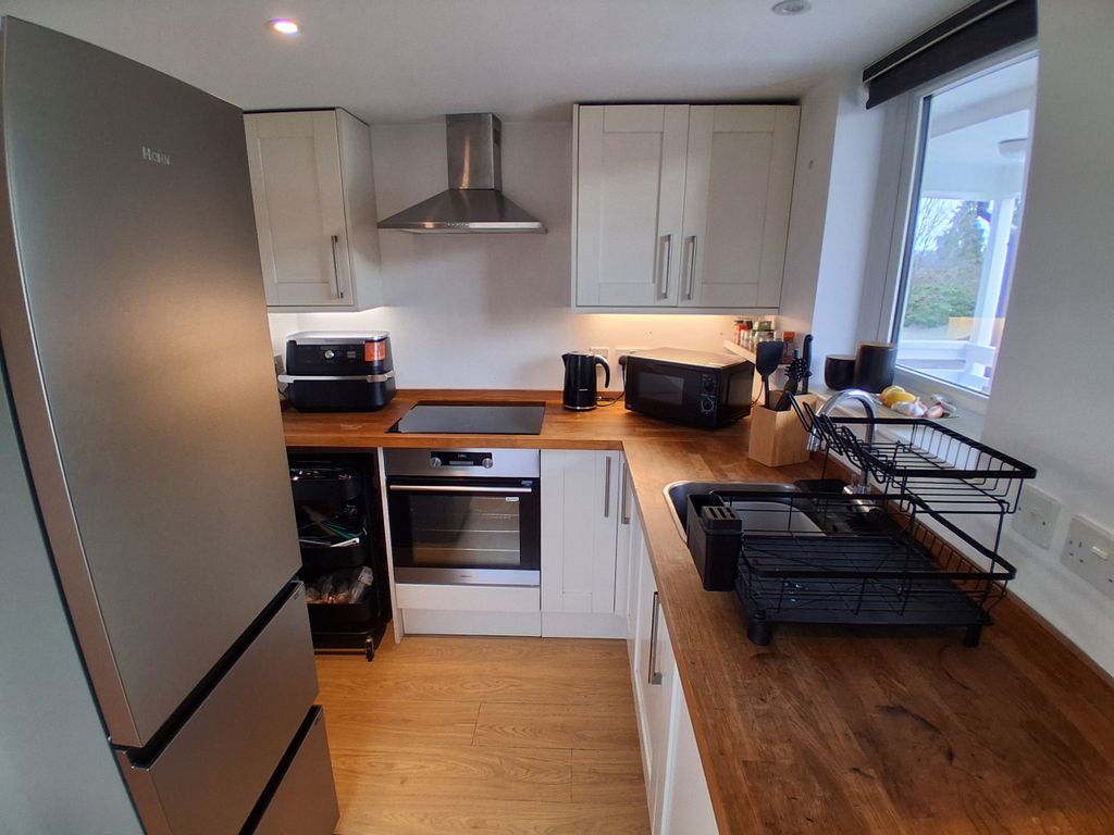 Property photo 3 of 7 Kitchen