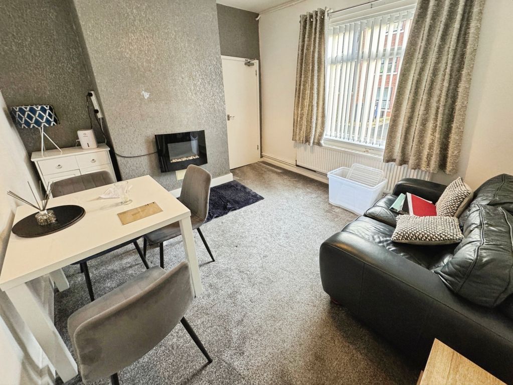 Property photo 2 of 8 Living Room