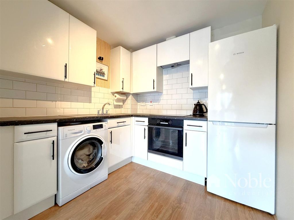 Property photo 2 of 15 Kitchen Area
