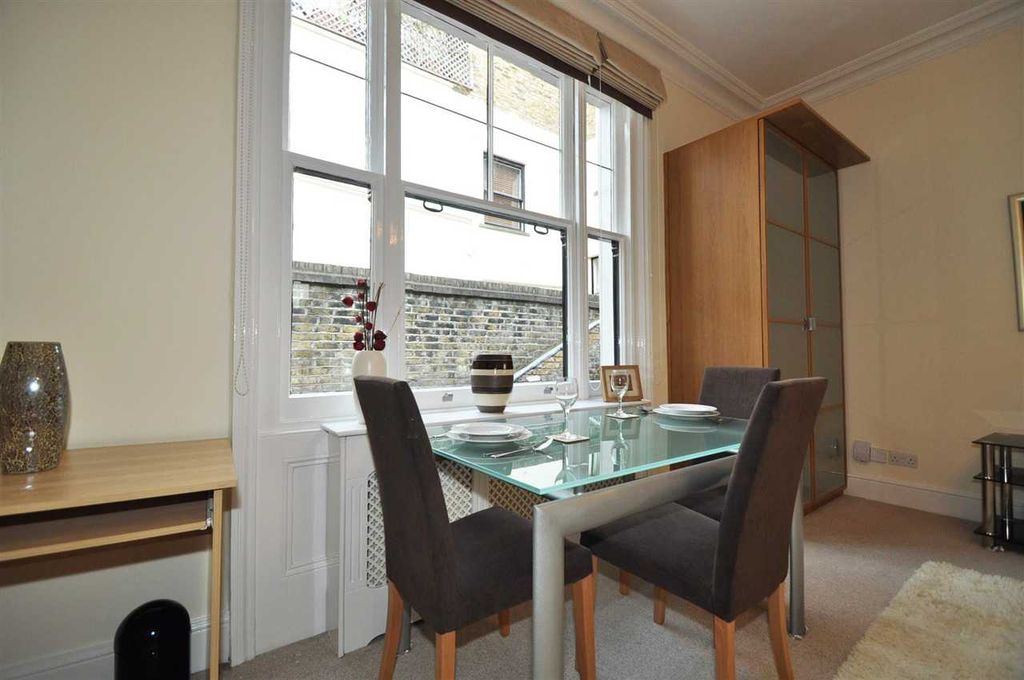 Property photo 3 of 6 Dining Area