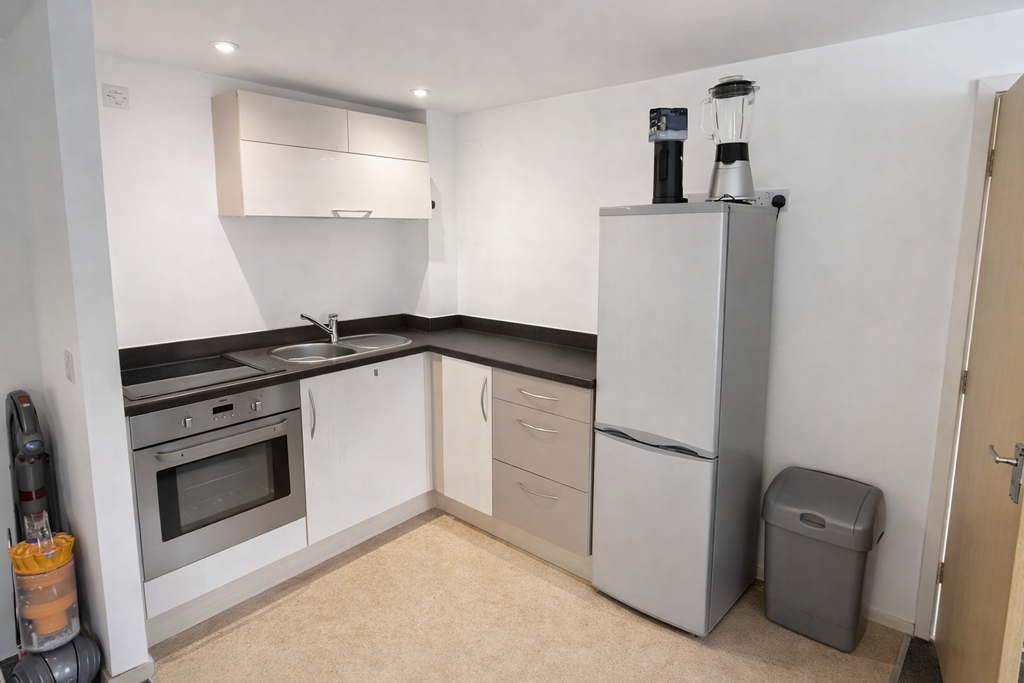 Property photo 3 of 9 Modern Compact Kitchen With Stainless Steel Appliances