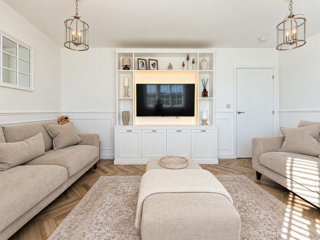 Property photo 2 of 23 Bright Symmetrical Neutral Living Room.Png