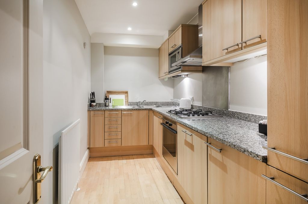Property photo 3 of 7 Kitchen