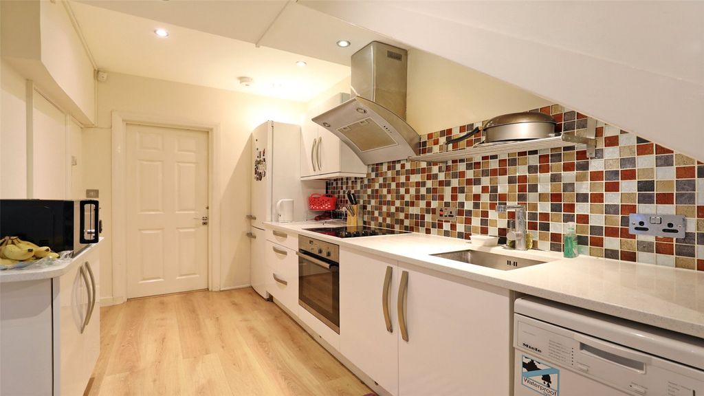 Property photo 3 of 12 Kitchen