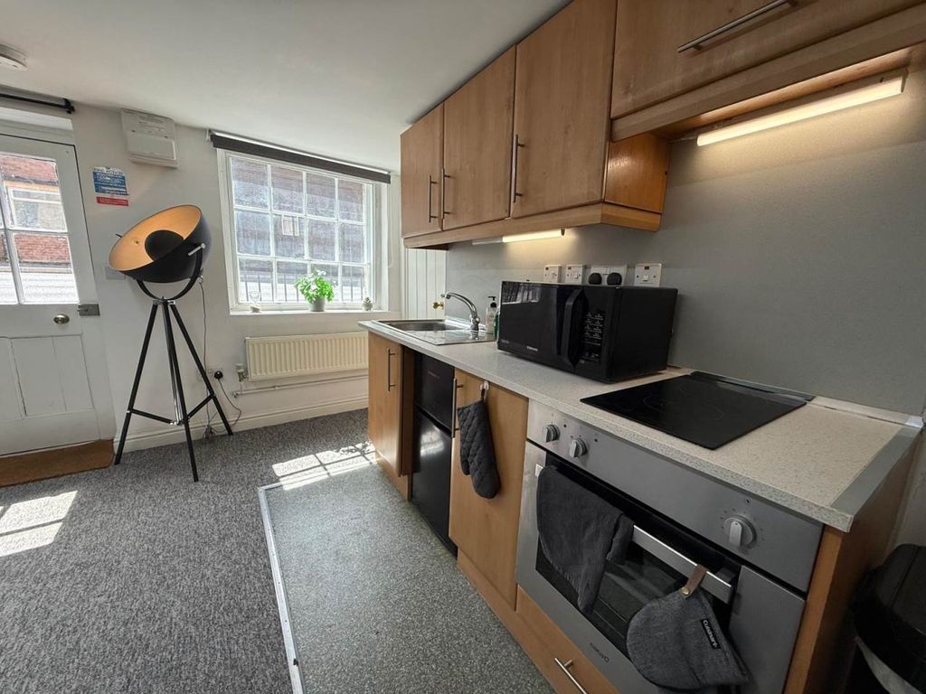 Property photo 3 of 13 Kitchen Area