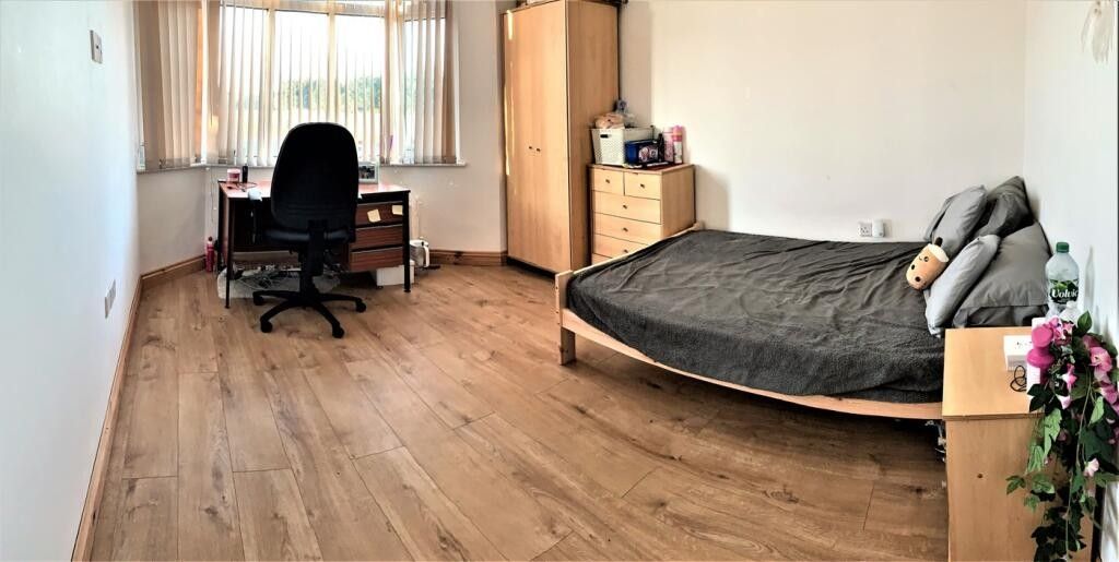 Property photo 2 of 12 This Inviting Double Bedroom Features Ample Natura...