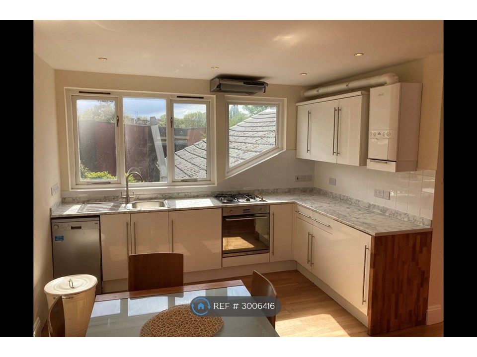 Property photo 1 of 8 Kitchen Area