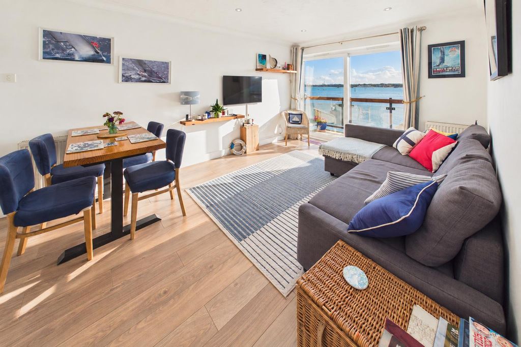 Property photo 2 of 19 Sunlit Coastal Living Room With Sea View.Png