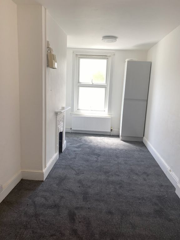 Property photo 3 of 6 A Bright And Tidy Living Room With Good Natural li...