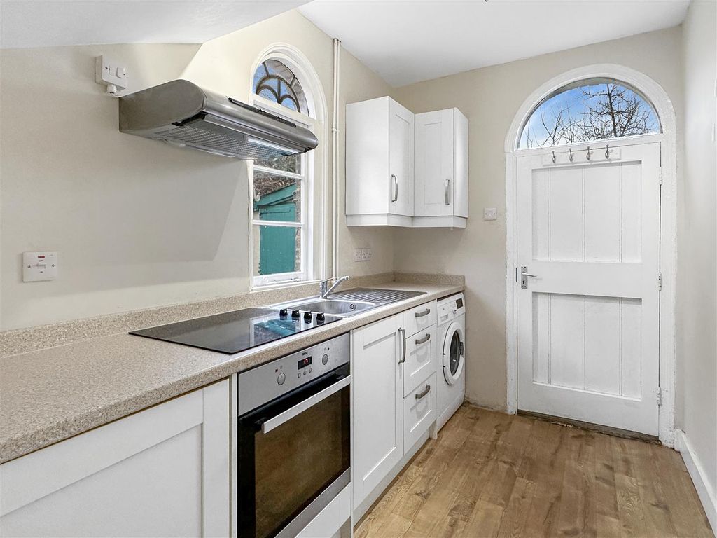 Property photo 2 of 12 Kitchen