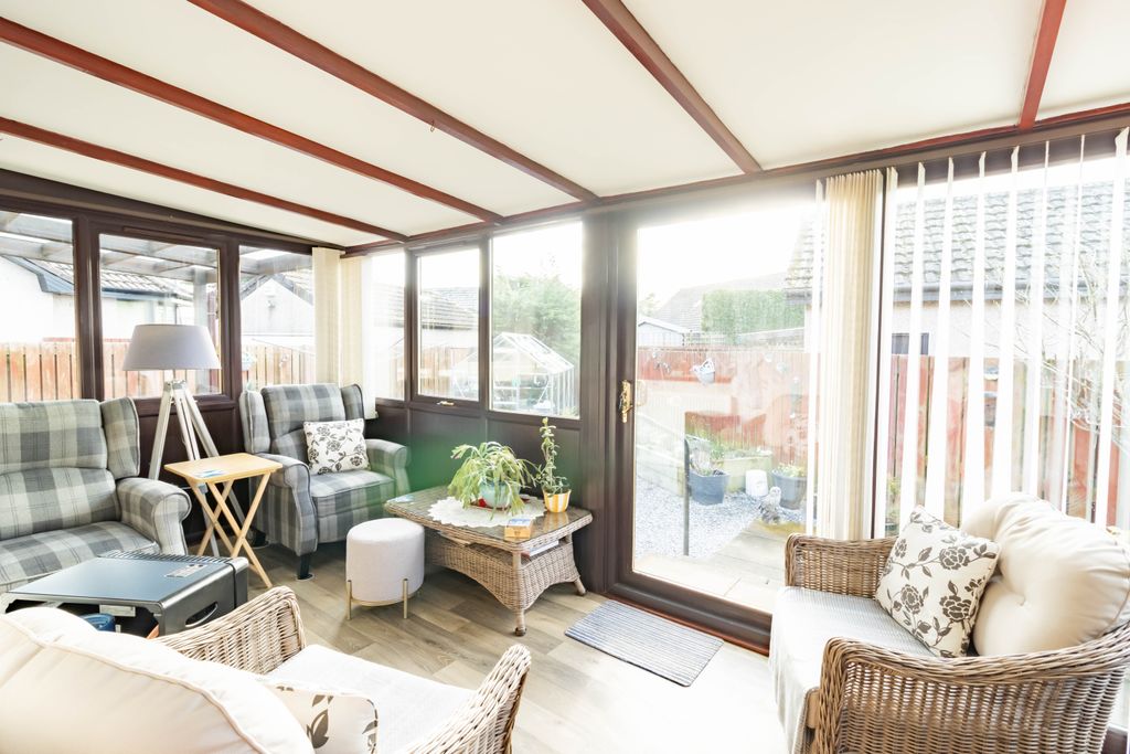 Property photo 3 of 24 Sun Room