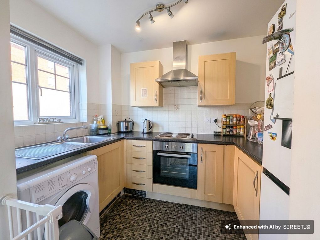 Property photo 3 of 13 Kitchen