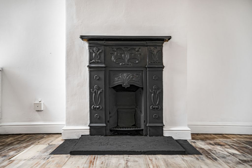 Property photo 3 of 12 Fireplace