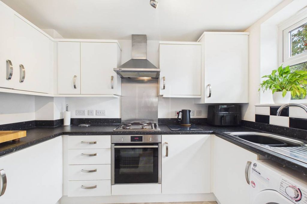 Property photo 2 of 12 Kitchen