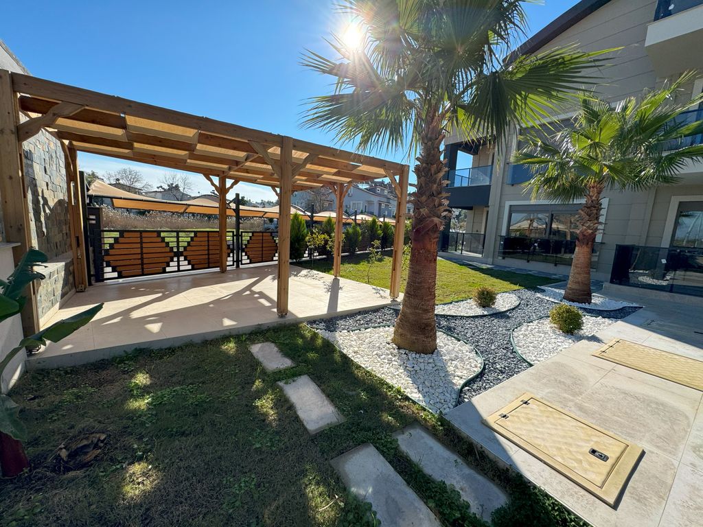 Property photo 2 of 22 Delightful Duplex Belek Apartment For Sale - Beautiful Social Areas And Pretty Gardens