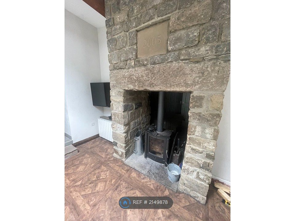 Property photo 3 of 13 Fireplace