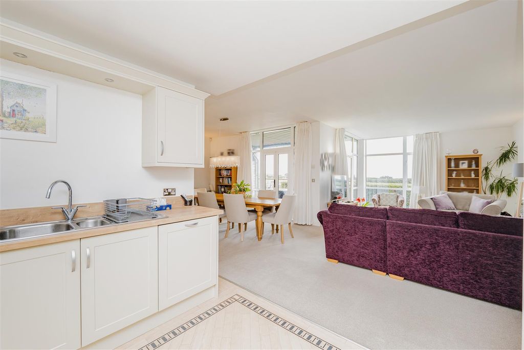 Property photo 3 of 26 Kitchen/Dining/Living Area