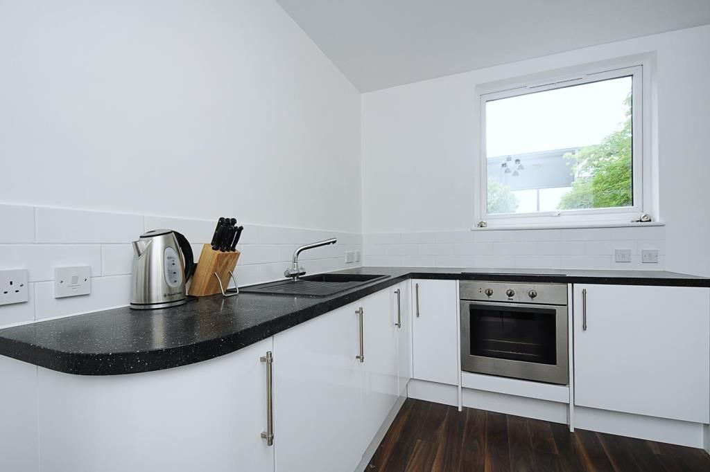 Property photo 3 of 7 Kitchen