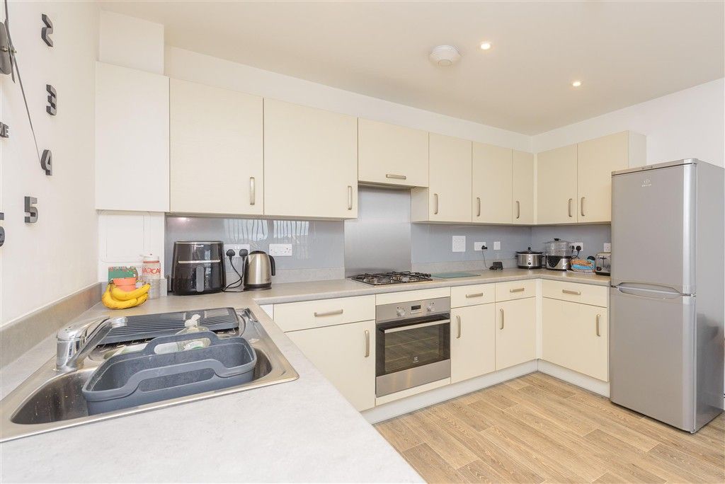 Property photo 2 of 8 Kitchen/Living Area