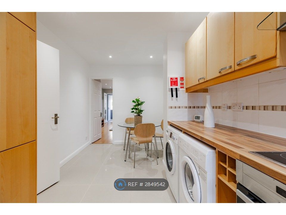 Property photo 2 of 16 Kitchen Towards Living Room