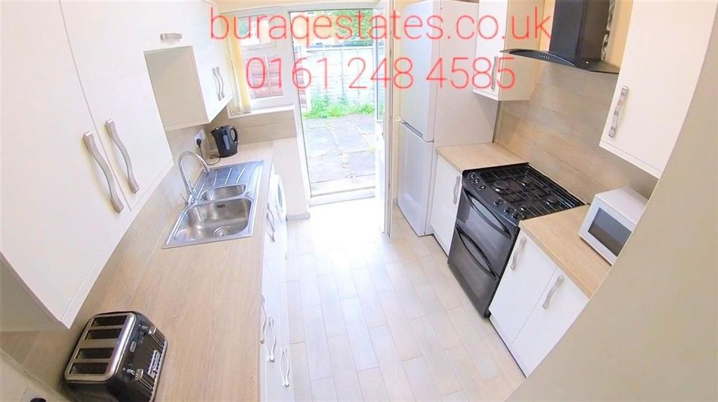Property photo 2 of 13 Bright, Modern Galley Kitchen With Light Wood Work...