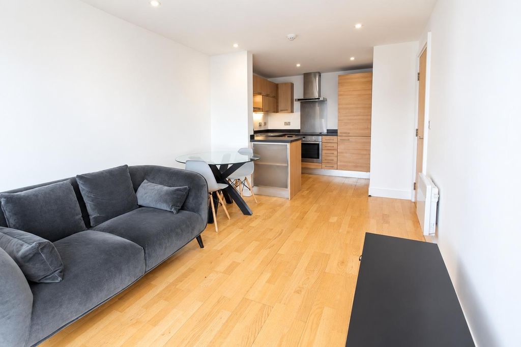 Property photo 2 of 8 Bright Open-Plan Living Room And Modern Kitchen...
