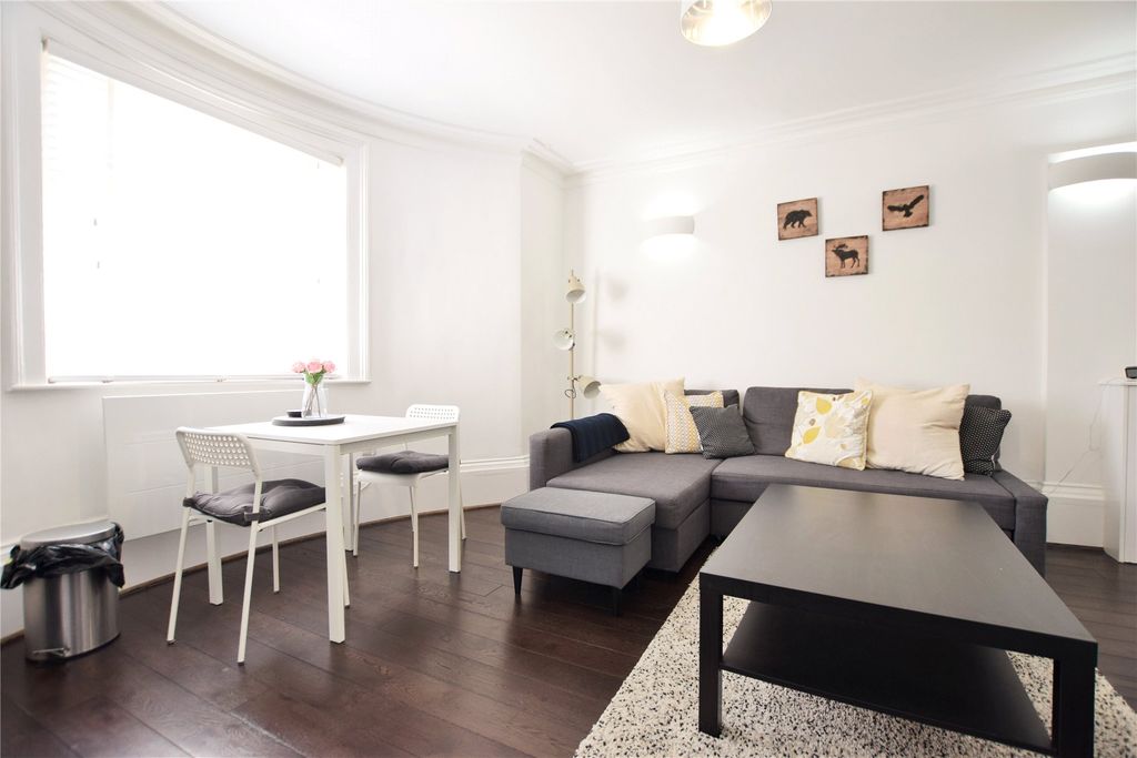 Property photo 3 of 8 Living Area