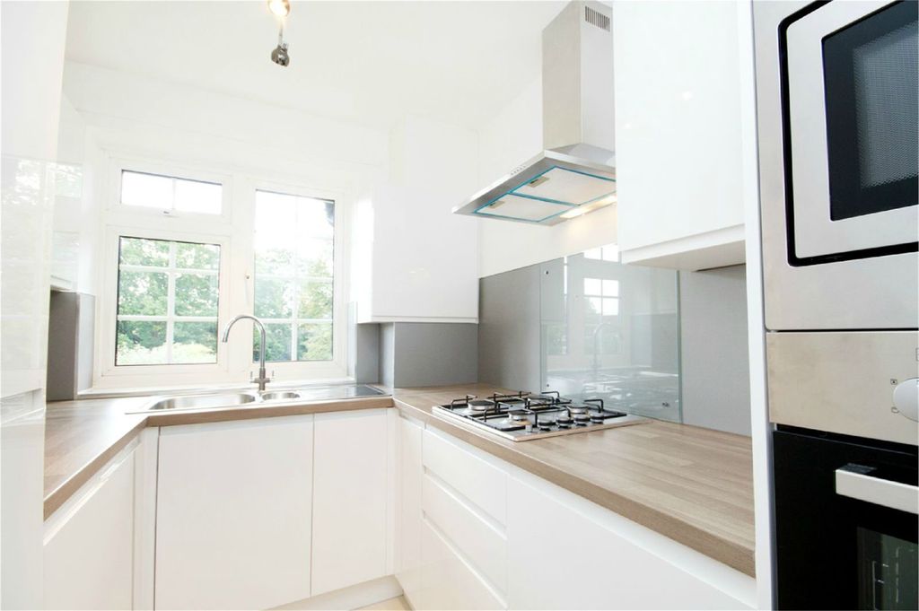 Property photo 3 of 8 2 - Kitchen