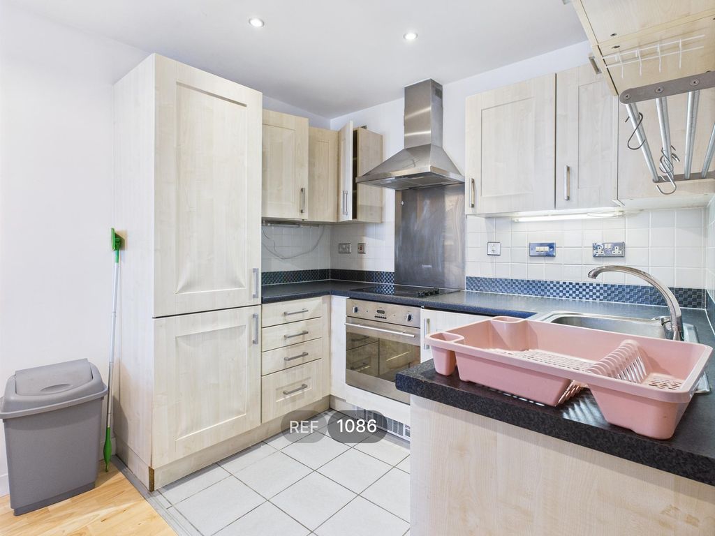 Property photo 2 of 18 Kitchen & Living Area