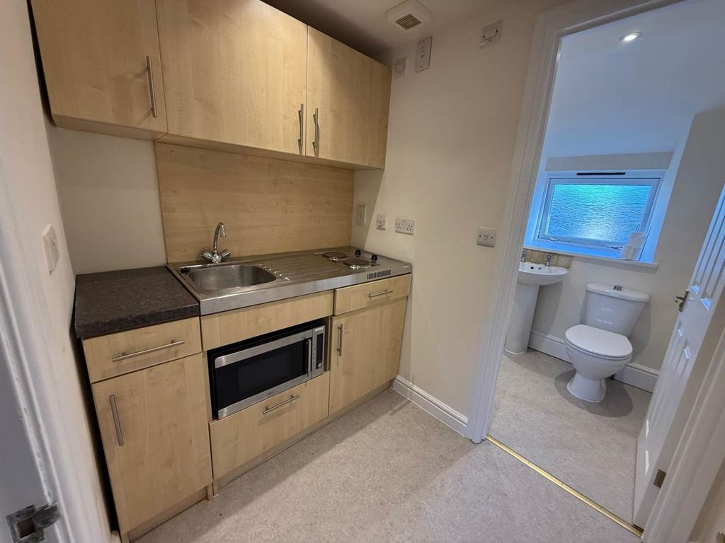 Property photo 2 of 5 Kitchen Area