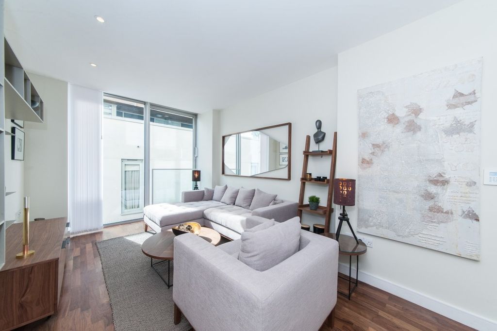 Property photo 3 of 8 Living Area