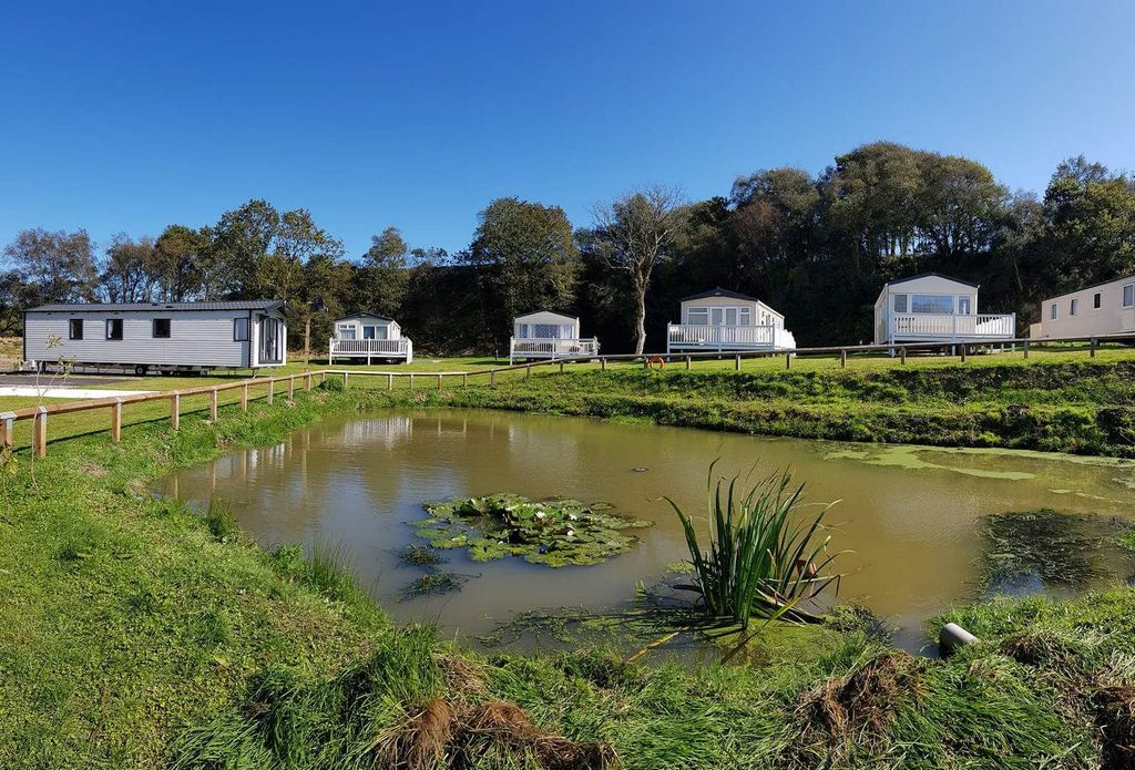 Property photo 2 of 20 Duck Pond With Units Back Ground