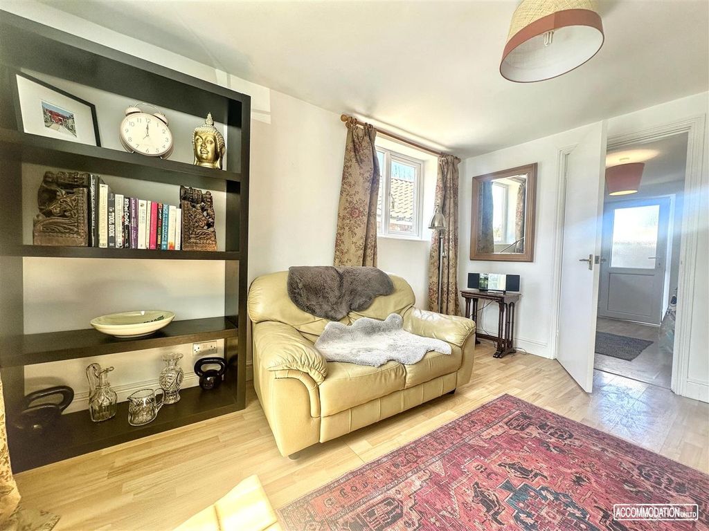 Property photo 3 of 7 Bright And Cozy Lounge With Stylish Wood Floors....