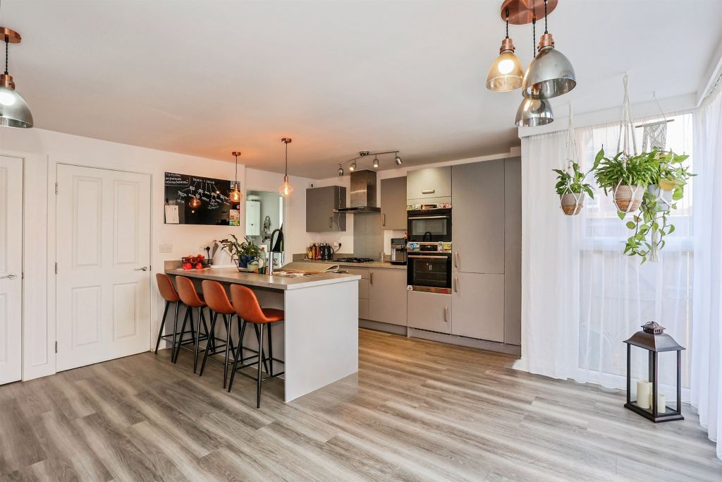 Property photo 2 of 17 Kitchen/Family/Dining Room