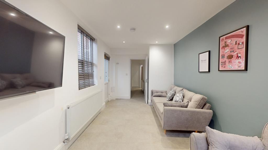 Property photo 2 of 14 A Spacious And Inviting Modern Living Room, Perfec...